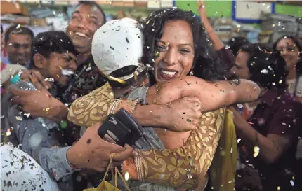  ?? AFP/GETTY IMAGES ?? Indian members and supporters of the LGBT community celebrate the court’s decision Thursday.