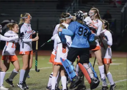  ?? THOMAS NASH — DIGITAL FIRST MEDIA ?? Members of the Perkiomen Valley field hockey team celebrate after Tuesday’s 3-2 win over Easton during the opening round of the PIAA Class AAA playoffs.