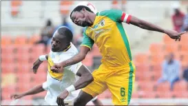  ?? Picture: SAMUEL SHIVAMBU, BACKPAGEPI­X ?? HEAD STRONG: Victor Obinna is challenged by Olaleng Shaku during yesterday’s Telkom Knockout match at Peter Mokaba Stadium.