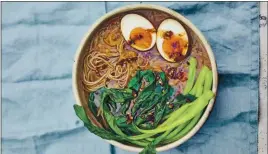  ?? COURTESY OF DAVID LOFTUS ?? Caramelize­d onion and chile ramen, from Meera Sodha’s “East,” is inspired by French onion soup.
