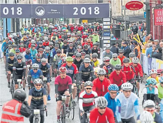  ?? Picture: Gareth Jennings. ?? And they’re off! The cyclists start their gruelling 85-mile circuit through Perthshire.