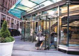  ?? MICHAEL NAGLE BLOOMBERG ?? Banks remain wary of setting firm dates of when they’ll reopen offices. JPMorgan Chase, for one, is planning on a return of interns this summer.