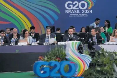  ?? AP ?? Brazilian Finance Minister Fernando Haddad, centre, speaks during the G20 Finance Ministers and Central Bank Governors meeting in Sao Paulo, Brazil, Thursday, February 29, 2024.