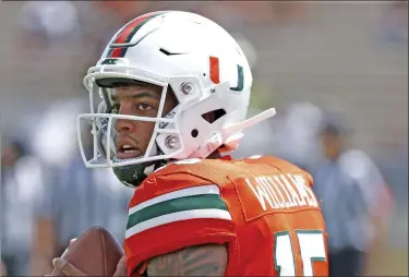  ?? AL DIAZ — THE ASSOCIATED PRESS ?? Miami quarterbac­k Jarren Williams sets up to pass during a scrimmage in Miami on April 13.