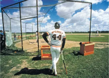  ?? Focus on Sport / Getty Images 1970s ?? The Giants’ Willie McCovey awaits his turn at the batting cage in spring training in Phoenix in the 1970s.