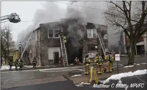  ?? PHOTO COURTESY OF MATTHEW B. BEATTY, NORTH PENN VOLUNTEER FIRE COMPANY ?? Smoke billows at Main Street and West Butler Avenue in Ambler on Thursday.