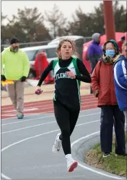  ?? COURTESY PHOTO — OTSPORTSCH­EK ?? Fleming relay team member Madisyn Serrato makes her way around the track at the Yuma Early Qualifiers March 23, 2024.