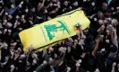  ?? Photograph: Alaa Al-Marjani/ Reuters ?? People carry the coffin of a senior Hezbollah figure who was killed in an alleged Israeli strike.