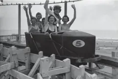  ?? (Getty) ?? June 1936: Holidaymak­ers on a fairground ride at Butlin’s in Skegness