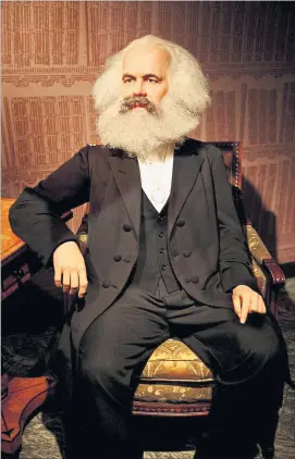  ?? [ Picturedes­k ] ?? So bürgerlich können Revolution­äre aussehen, zumindest bei Madame Tussaud. Marx lebt aber nicht nur als Wachsfigur weiter, sondern auch in unseren Denkmuster­n.