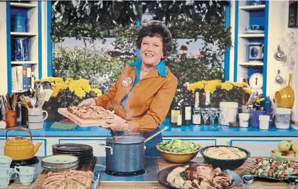  ?? JIM SCHERER SONY PICTURES CLASSICS/THE ASSOCIATED PRESS ?? “Julia” digs a little deeper into the larger-than-life personalit­y of Julia Child, who brought French cuisine into American homes.