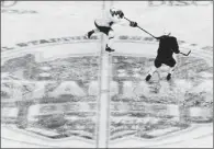  ?? Matt Freed/Post-Gazette ?? Penguins players said Friday the ice outdoors at Soldier Field in Chicago was in better shape than expected.