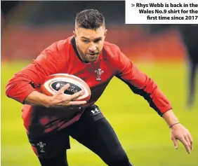  ??  ?? > Rhys Webb is back in the Wales No.9 shirt for the first time since 2017