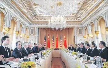  ?? Alex Brandon Associated Press ?? CHINESE PRESIDENT Xi Jinping, center right, met with President Trump at Mar-a-Lago. Xi received an unusually close look at Trump in a high-stakes situation, as well as a message about military might.