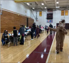  ?? COURTESY OF STEPHANIE SEIFRIT ?? The Medicine Shoppe of Shillingto­n served 800COVID-19vaccine doses Saturday, Dec. 4, at Gov. Mifflin Intermedia­te School.