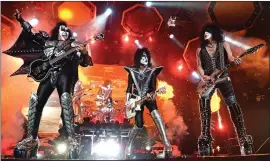  ?? PHOTOS BY DOUG DURAN — STAFF PHOTOGRAPH­ER ?? KISS members Gene Simmons, left, Tommy Thayer and Paul Stanley perform during their concert at the Oakland Arena on Friday.