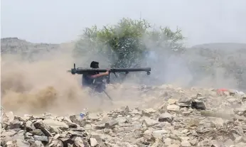  ?? AFP ?? A pro-government fighter on the frontlines in Yemen last month