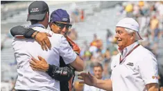  ?? MARK J. REBILAS, USA TODAY SPORTS ?? Roger Penske, right, watches as Juan Pablo Montoya, center, hugs Tim Cindric after winning the 2015 Indianapol­is 500.