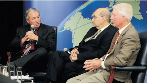  ?? STUART GRADON/ CALGARY HERALD/ FILE ?? University of Calgary professor Jack Mintz was flanked by former Alberta finance ministers Ron Liepert, left, and Ted Morton, right, at a U of C School of Public Policy debate at the Fairmont Palliser in Calgary in September of 2013.