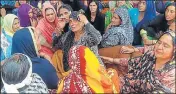  ?? HT PHOTO ?? Relatives mourn the death of Aurangzeb, whose bulletridd­en body was found in Pulwama on Thursday night, at Salani village of Poonch on Friday.