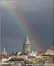 ?? REUTERS ?? A rainbow paints the sky over Istanbul’s landmark Galata Tower. Players in Turkey’s tourism sector aim to expand the market, hoping for a better season in 2021.