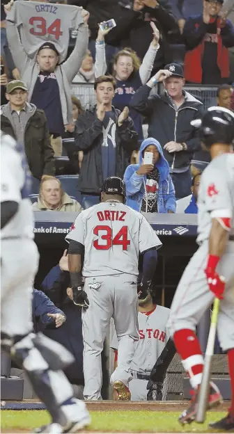  ?? AP PHOTO ?? IT’S OVER: David Ortiz draws some applause as he leaves the game after being replaced by a pinch runner during last night’s game in New York.