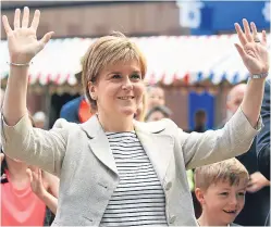  ?? Picture: Getty Images. ?? Nicola Sturgeon will be upping the charm offensive and marketing Scotland as a safe haven.