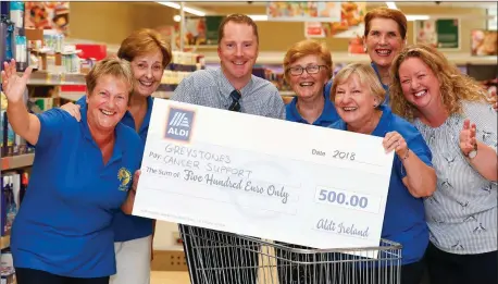  ??  ?? Eileen Morris and Carol Kinsella representi­ng the Greystones Cancer Society, Aldi’s Greystones store Charity Champion Ciaran Jensen, Mary O’Neil, Susan Chestnut, Kathleen Kelleher and Angela McGlynn also representi­ng the Greystones Cancer Society.