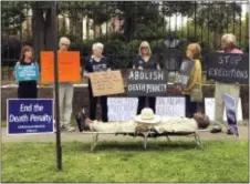  ?? SHERRY SIMON VIA AP ?? This photo provided by Sherry Simon shows Pulaski County Circuit Judge Wendell Griffen taking part of an anti‑death penalty demonstrat­ion outside the Governor’s Mansion Friday in Little Rock, Ark. Griffen issued a temporary restrainin­g order Friday...