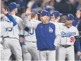  ?? JED JACOBSOHN/AP ?? Dodgers manager Dave Roberts after Saturday night’s 9-2 victory that tied their series against the Giants at one game apiece: “I like where we’re at.”