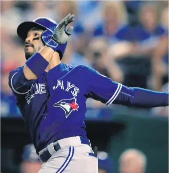  ?? THE CANADIAN PRESS/FILES ?? Toronto Blue Jays’ Devon Travis is proving to be fully recovered from off-season knee surgery at spring training. He’s determined to be ready for the season-opener in two weeks time.
