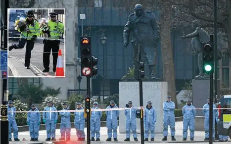  ?? PHOTOS: FACUNDO ARRIZABALA­GA/EPA ?? SCENE OF THE CRIME: With a statue of Winston Churchill watching over them, forensic officers prepare to conduct a search around the Houses of Parliament. Inset: Police carry flowers to place at a memorial to the victims.