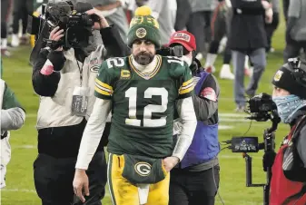  ?? Morry Gash / Associated Press ?? Aaron Rodgers departs after the 2021 NFC Championsh­ip Game, a loss to Tampa Bay. Despite his frustratio­n with the team, Rodgers appears on track to return to Green Bay this season.