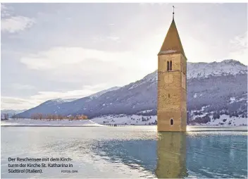  ?? FOTOS: DPA ?? Der Reschensee mit dem Kirchturm der Kirche St. Katharina in Südtirol (Italien).