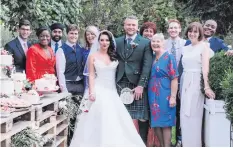  ?? HELLO! MAGAZINE ?? Andrew and fellow contestant­s at Candice Brown’s wedding to Liam Macauley