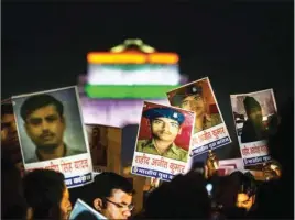  ?? PTI ?? Indian Youth Congress during a candle light march to pay tributes to Central Reserve Police Force (CRPF) jawans at India Gate on Friday