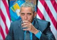 ?? CAROLYN KASTER/AP PHOTO ?? President Barack Obama drinks filtered Flint water during a briefing on the response and recovery plans of the ongoing water crisis Wednesday.