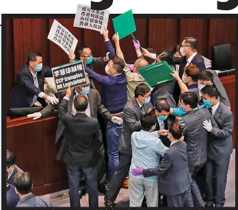  ??  ?? Protest: Pro-democracy politician­s in Hong Kong yesterday