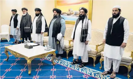  ?? PATRICK SEMANSKY/AP ?? The Taliban peace negotiatio­n team shown in November 2020 during talks with Afghan government officials in Doha, Qatar.