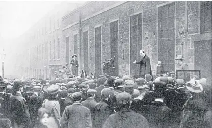  ??  ?? Miss Mary Maloney disrupts Winston Churchill’s speech as he addresses crowds outside a building in Dundee.