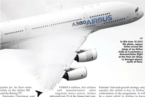  ?? AP ?? In this June 18 2015 file photo, vapour forms across the wings of an Airbus A380 as it performs a demonstrat­ion flight at the Paris Air Show, Le Bourget airport, north of Paris.