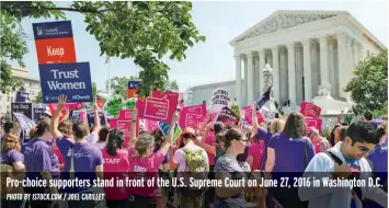  ?? PHOTO BY ISTOCK.COM / JOEL CARILLET ?? Pro-choice supporters stand in front of the U.S. Supreme Court on June 27, 2016 in Washington D.C.