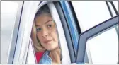  ??  ?? ON THE ROAD: Actress Rosamund Pike ready for the road.