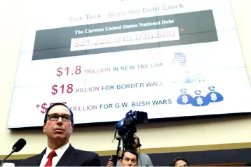  ??  ?? US Secretary of the Treasury Steven Mnuchin testifies to the House Financial Services hearing on state of the internatio­nal financial system on Capitol Hill in Washington, July 12. — Reuters photo