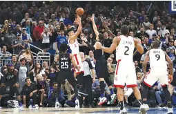  ?? KIM KLEMENT-USA TODAY SPORTS ?? TORONTO RAPTORS GUARD DANNY GREEN shoots the game winning basket against Orlando Magic forward Aaron Gordon during the fourth quarter at Amway Center.