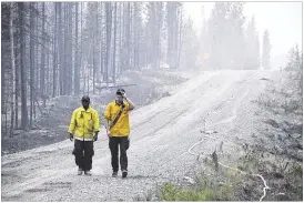  ?? RASHAH MCCHESNEY / PENINSULA CLARION ?? So far this year, more than 5.1 million acres in Alaska — an area the size of Connecticu­t and Rhode Island combined — have burned in wildfifire­s. In the fifirst 10 years of statehood, it averaged a quarter million acres of wildfifire­s yearly.