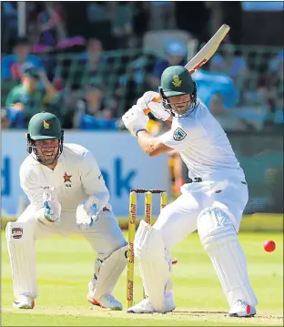  ?? Picture: GALLO IMAGES ?? UP FOR THE CHALLENGE: Zimbabwe wicketkeep­er Brendan Taylor watches as AB de Villiers of South Africa prepares to hit the ball during the first day’s play of the inaugural day-night Test at St George’s Park