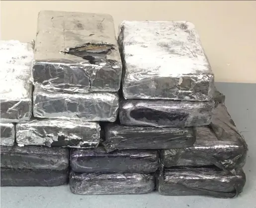  ?? DEA ?? The DEA and the Kane County Heroin Initiative Task Force seized 16 kilograms of cocaine on Sept. 20 in Lake of the Hills and arrested two Carpenters­ville men. A surge in Colombian cocaine production is beginning to be felt in Chicago, authoritie­s say.