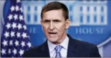  ?? CAROLYN KASTER — THE ASSOCIATED PRESS ?? President Donald Trump changed his story Saturday on why he fired Michael Flynn, shown above, as his national security adviser.