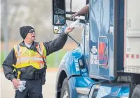  ?? FRANCIS GARDLER THE ASSOCIATED PRESS FILE PHOTO ?? The new U.S. highway regulation­s expected to save trucking firms an estimated nearly $274 million (U.S.) annually over 10 years.